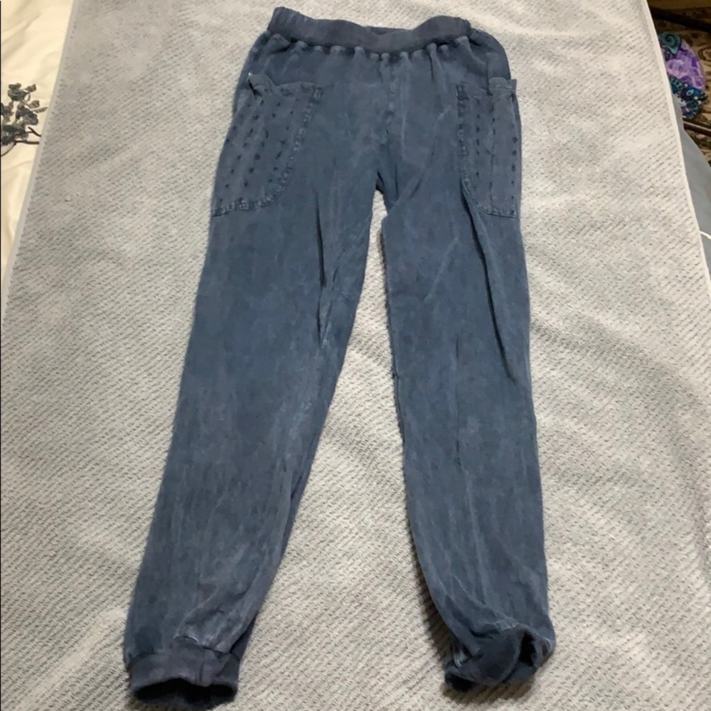 Super cute joggers with distressed pockets.